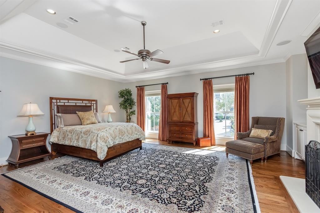 As one of the largest rooms in the home, the gorgeous master suite offers relaxation like no other. Large windows let a wealth of natural light stream in, while the tray ceiling adds drama to the room.