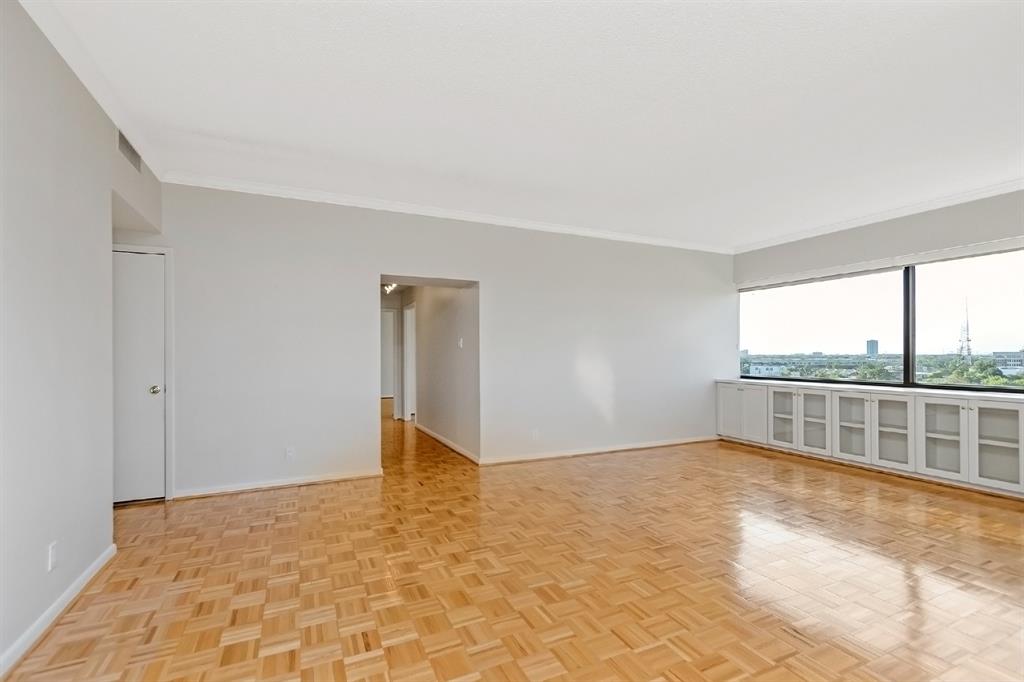 You'll be impressed with the open floor plan and the seamless transition between the living area and the bedrooms. Down the hallway, you're bound to discover a secondary bedroom and a primary bedroom tucked away for its privacy.