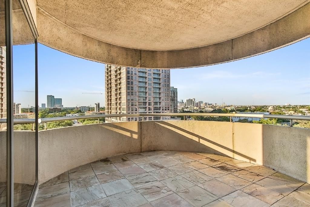 Relax atop this magnificent balcony displaying breathtaking sunrise and sunset views. Blue skies and luscious foliage abound here. With so much expanse, this decking makes relaxing, outdoor grilling, or simply enjoying the outdoors possible.