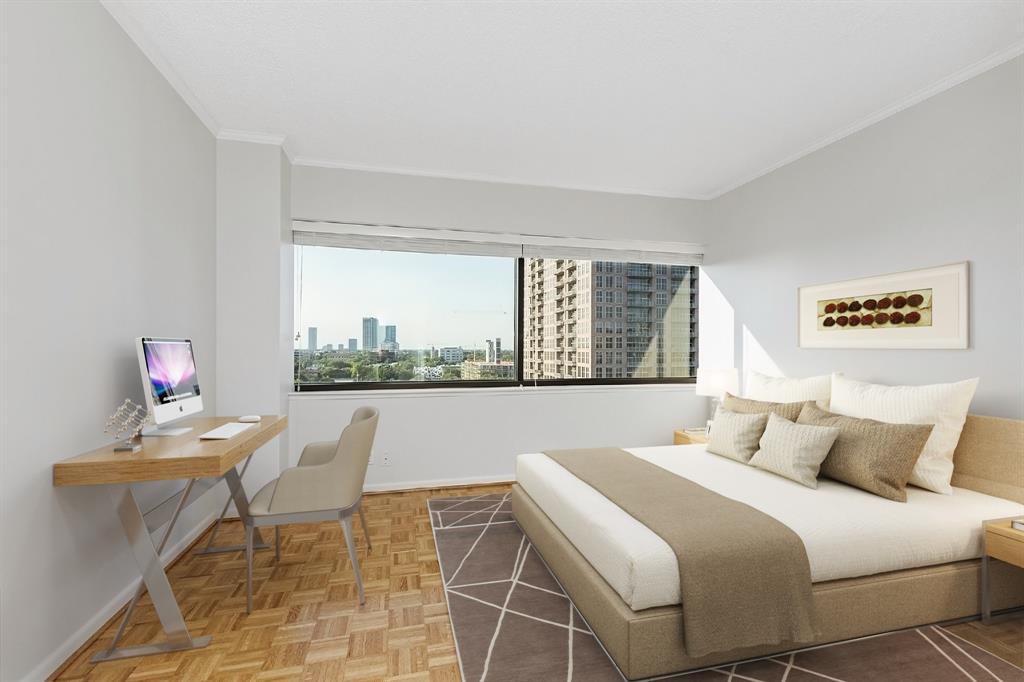 This generously-sized secondary bedroom is perfect for welcoming family and guests alike to stay over. The calming color scheme and abundant natural light will put them right at ease as they enjoy this incredible suite.