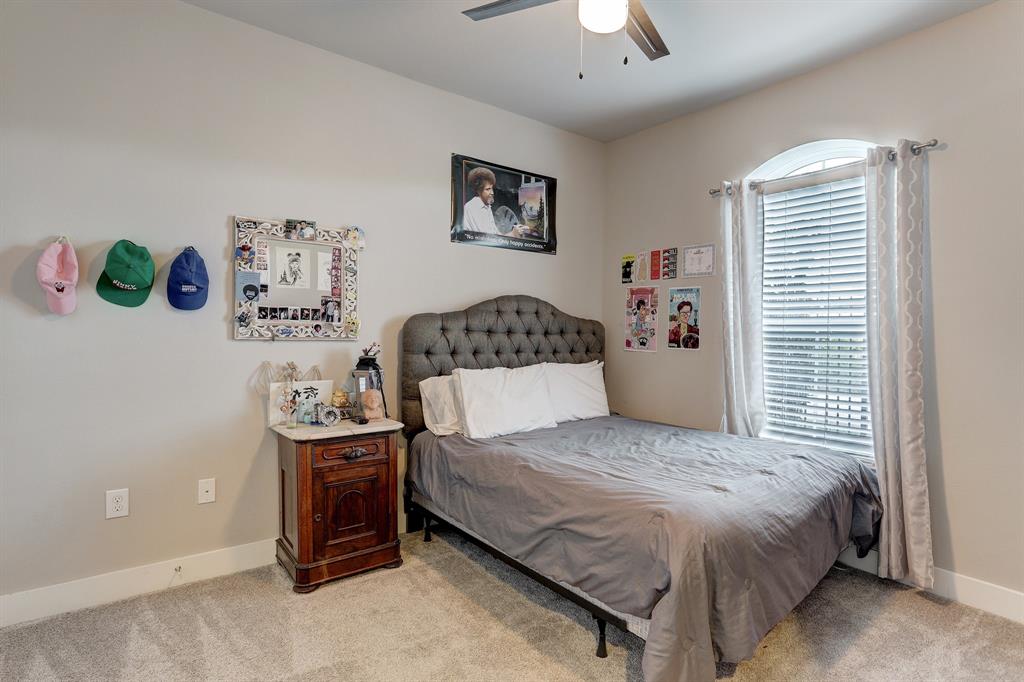 The second bedroom can serve as a guest room and can easily be transformed into an office. Work from home in style in this majestic space, with carpeted floors and plenty of natural light coming in through the large window.