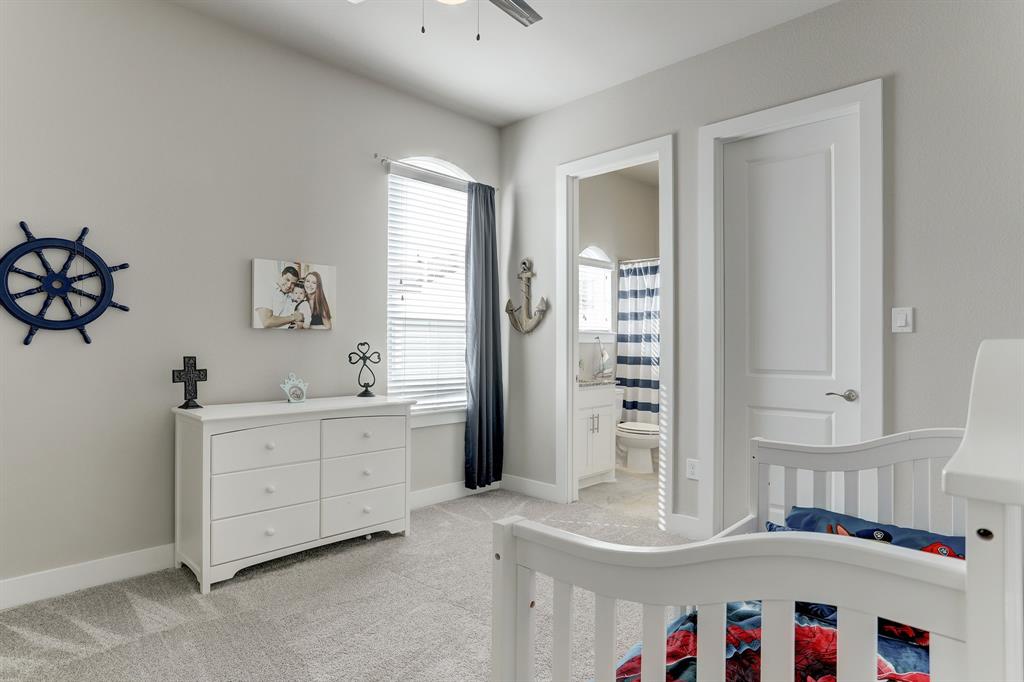 This multipurpose room can also be used as a secondary bedroom or guest bedroom. With its own private bathroom and a walk-in closet, this room is covered with great carpet flooring and a tall window that lets in natural light which illuminates the entire room.