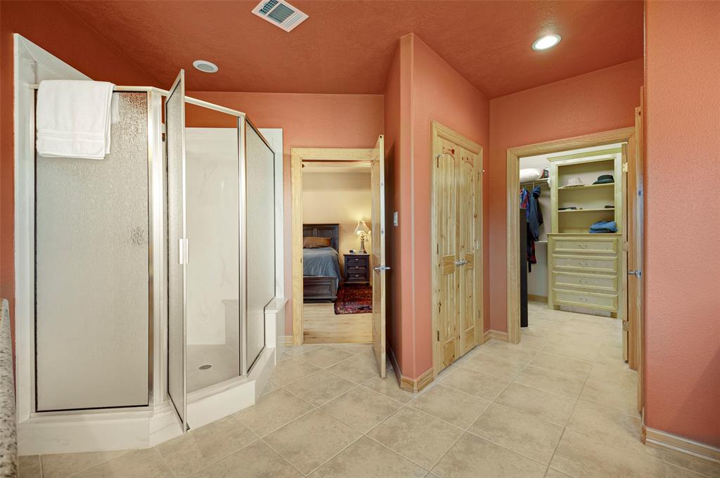 No ensuite master bath is complete without an oversized shower and a huge walk-in closet with plenty of beautiful builtins!
