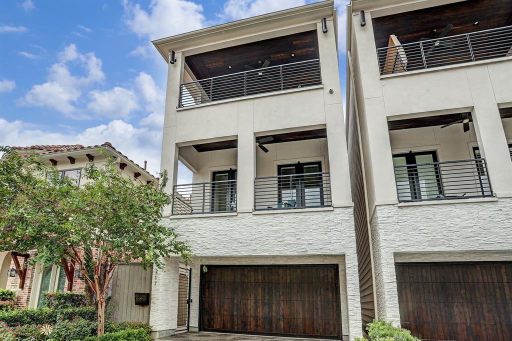 This immaculate 3-story townhome in Rice Military rivals new construction with its endless amenities and upgrades!