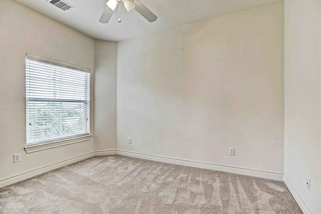 This third floor guest room is bright, a great size, and has a full bath attached.