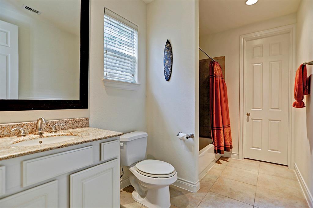 This lower floor guest bath is not only spacious but has its own closet. Your guests may never leave!