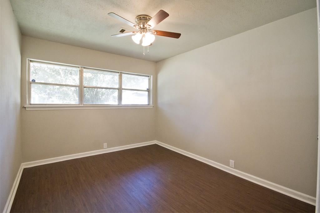 Large third bedroom with a row of front facing windows