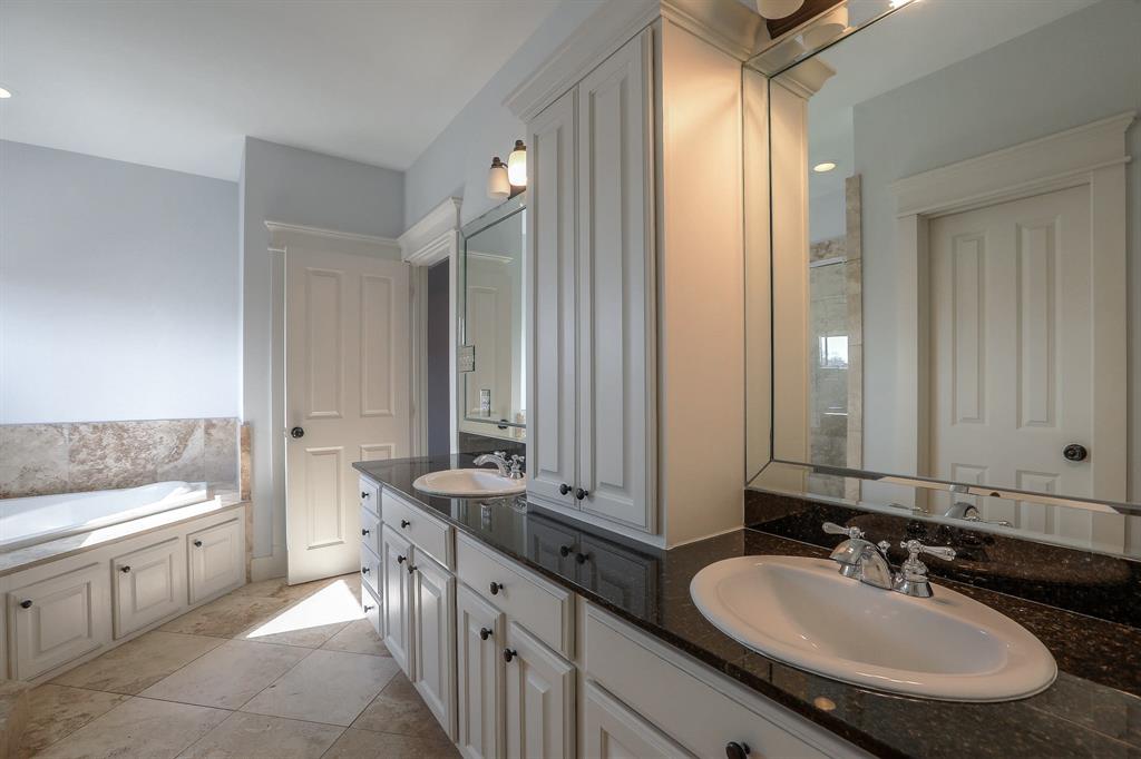 Master Bath features double sinks, whirlpool tub and separate shower.