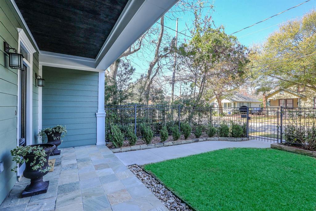 Your pets will enjoy the fenced yard with covered porch.