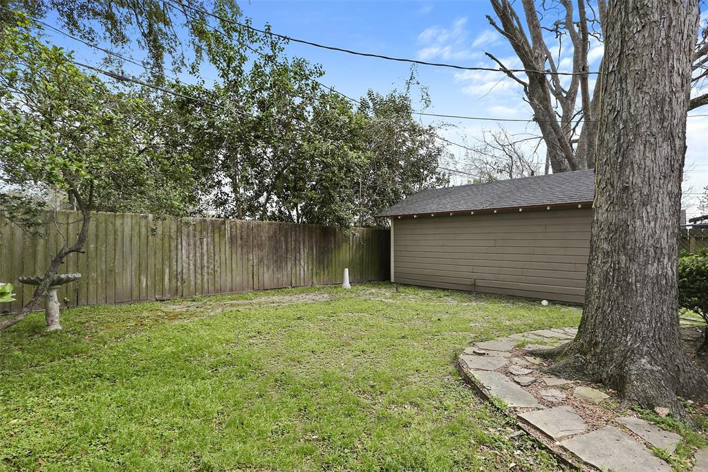 Large backyard is a great size to play with the dog, garden, or relax on the weekend.
