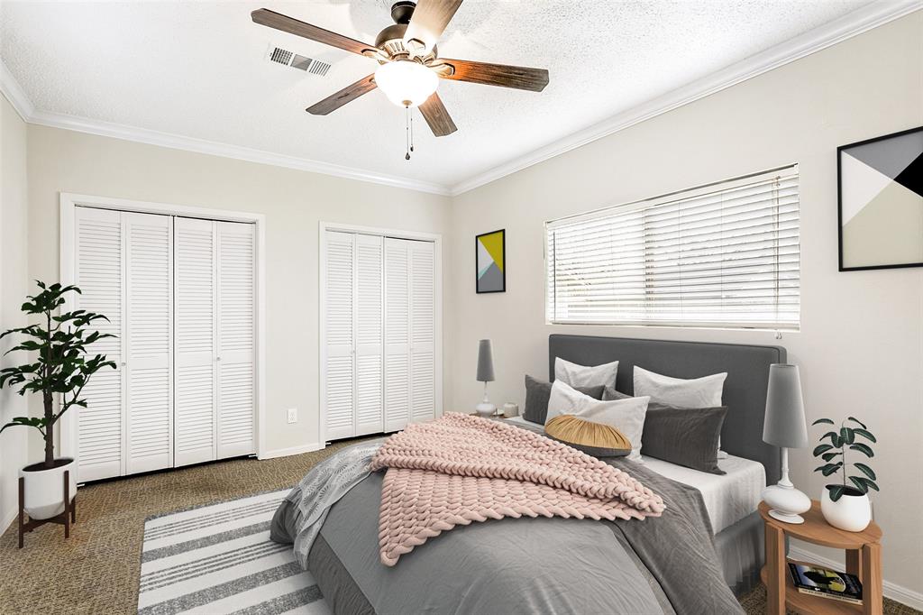 Lots of closet space in the master bedroom. This image has been virtually staged to provide you with a possible lay out of this great master bedroom.