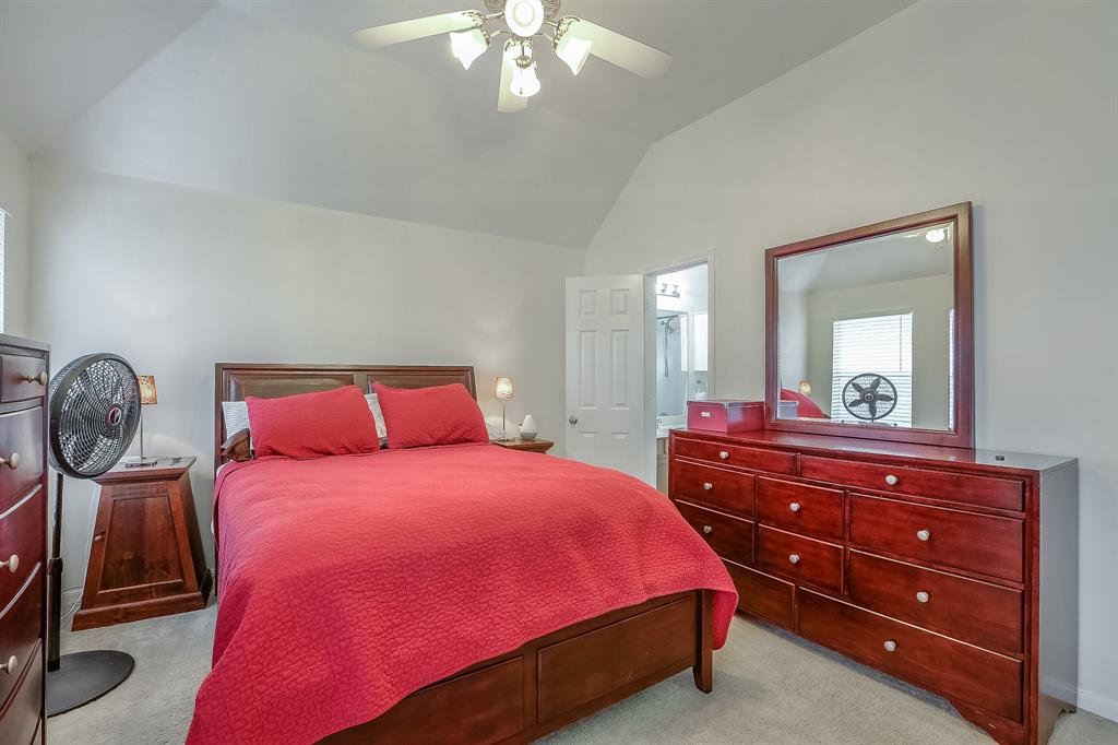 Generous master bedroom space...vaulted ceiling and loads of natural light to create your own perfect refuge. Leads to master bath.