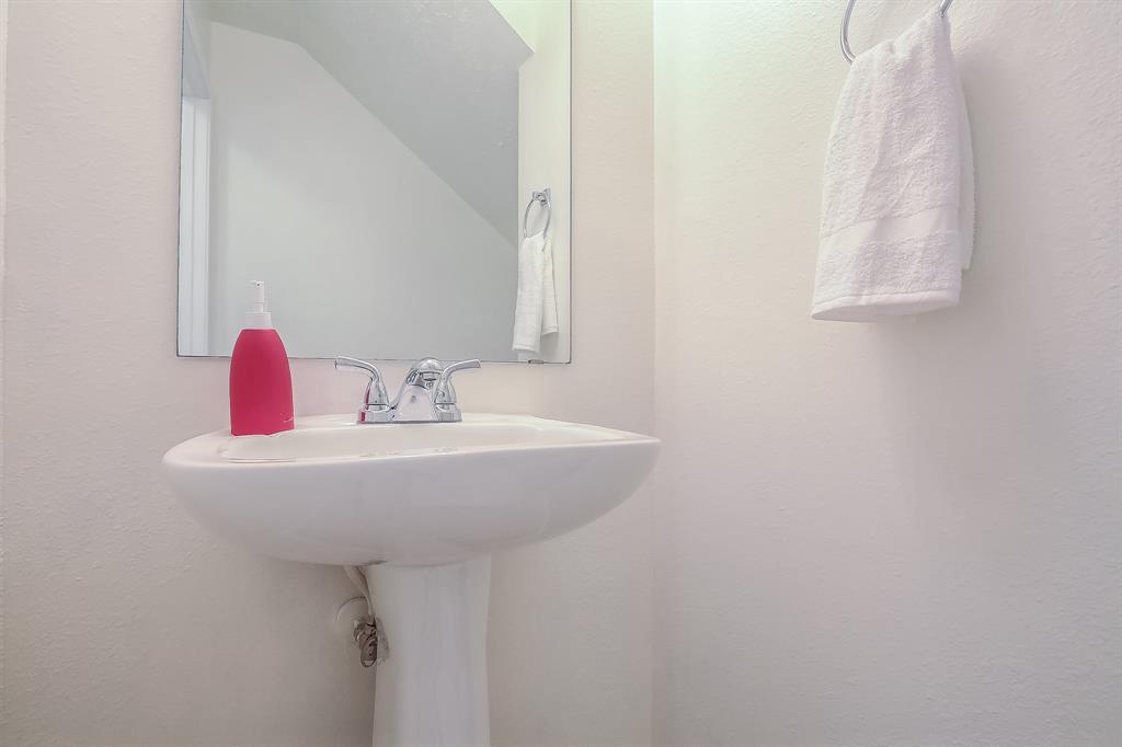 The incredibly important half-bath downstairs makes things easy, especially when you are entertaining guests!