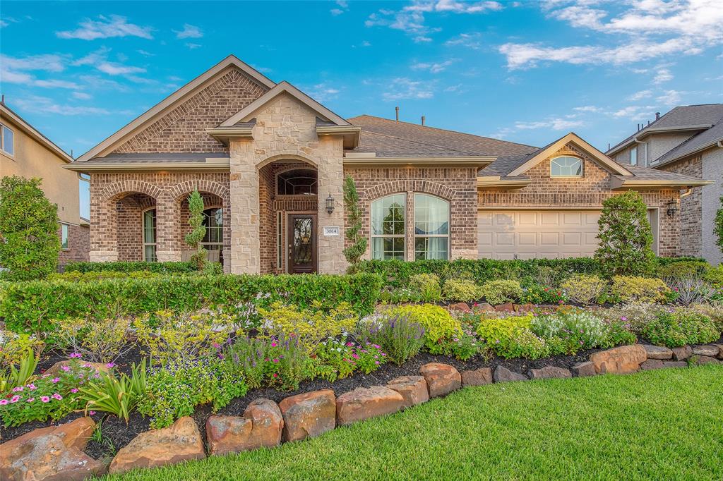3814 Everly Bend Drive Spring, Texas MLS# 66518069 - Built by Taylor Morrison - Ready Now! ~ Fantastic Former Model Home released for ownership! Brick and stone grace this expanded front porch to welcome you home. No detail was spared from the magnificent personal study to the entertainment kitchen, all of which boast speakers to let the good times flow! Five bedrooms all on the first level allow the family to stay connected, while the second floor captures all of your entertainment needs, featuring a gameroom, media room and entertainment bath. Just when you thought you could not have it all, the EMERSON plan delivers! Located on an oversized homesite, you are steps away from the Thicket, Harmony's community center with fitness room, swimming pool and community center!