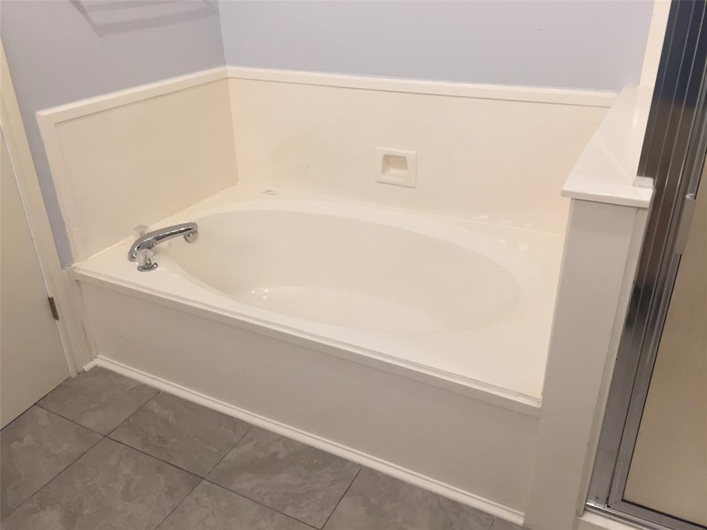 Master bath with soaking tub and separate shower