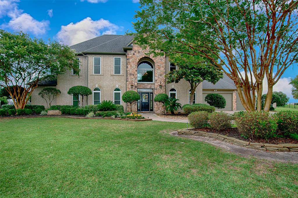 9066 North Point Drive Beach City, Texas This Gorgeous Custom Waterfront Home is in a sought after Gated Community, sitting on 2 acres surrounded by lavish landscaping & mature trees. This Luxurious 5-6 Bedroom 3.5 Bathroom Home is located on Trinity Bay w/ Magnificent views & a backyard paradise. The Grand Entryway w/ a Sweeping Staircase draws you into a layout made for entertaining! Featuring a Elegant Formal Dining Room, Butlers pantry, Large Custom Kitchen w/ island, Formal Living & Family Room & a Delightful study/office w/ custom built-ins! Upstairs you have a huge game room, massive media room & 4 secondary bedrooms. Outside leads you to the breath taking views so you can rejoice in the breeze on the brick paved patio beside your elegant pool & spa. Take a stroll to the pier & enjoy fishing, jet skiing & boating right at your fingertips! This stunning gem is minutes away from shopping, dining & in a exemplary BHISD school district. Don't miss out on all the extras in this home! Make your Appointment Today!!!