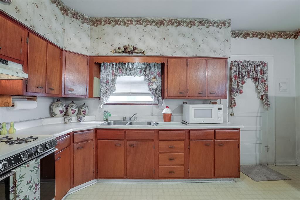 Spacious kitchen has a lot of potential.  This home is perfect for somone that is looking to put their personal touch to renovate or expand this home.