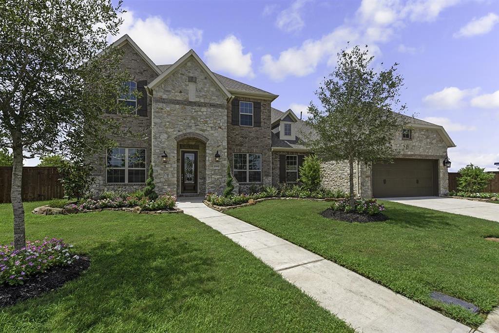 10002 Hooke Drive Iowa Colony, Texas NEW DAVID WEEKLEY HOME! Welcome to the glamorous style and classic comfort of The Overlook family home. Design an imaginative reading lounge or an impeccable home office in the lovely study. Begin and end each day in the unparalleled master bedroom, featuring an extensive walk in closet, spa-experience bathroom, and a sitting area in your personal sanctuary. The dine-in kitchen offers a presentation island, breakfast nook, and plenty of room for storage and meal prep. Your open concept floor plan includes a refined dining area and a breathtaking family room with beautiful backyard view. Each bedroom provides dynamic personality potential, extended closets, and unique appeal. Come together to share quality time and build lifelong memories in the vibrant upstairs retreat. Bonus features include a Jack-and-Jill bathroom, 3-car garage, and a breezy and beautiful outdoor living area. Model home open daily. 10102 Hooke Drive, Iowa Colony, TX 77583
