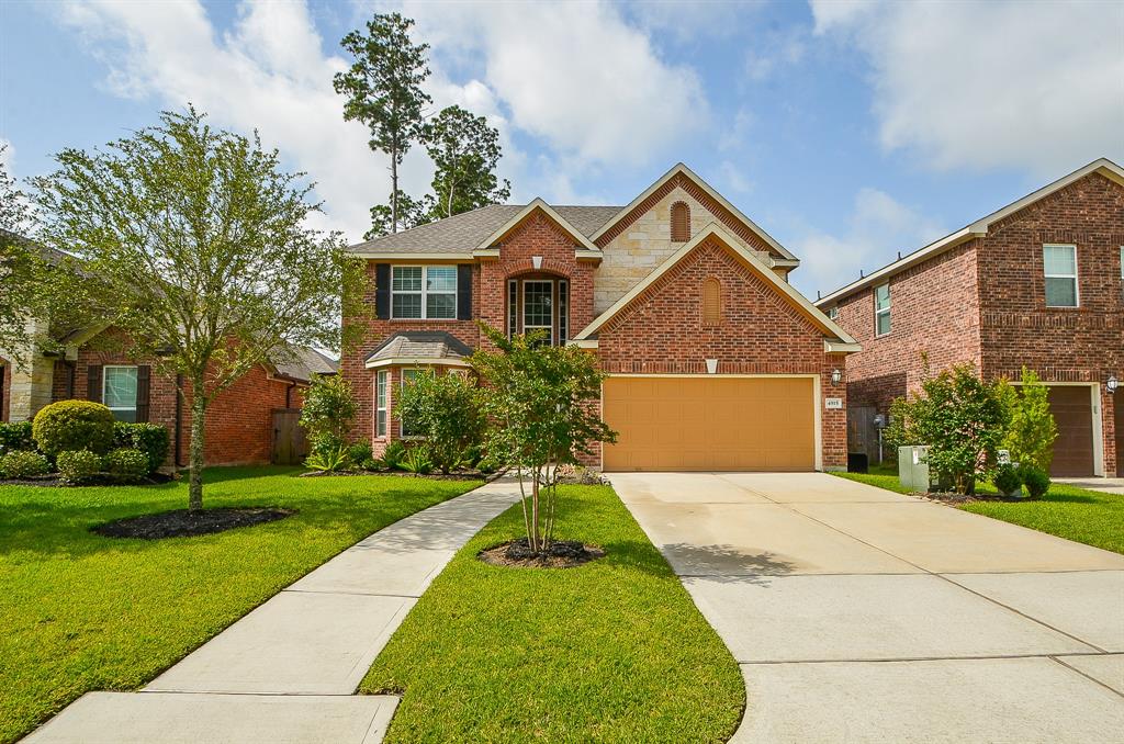 4915 Woodbury Mill Drive Spring, Texas 4Bed/3.5Bath home in a much sought-after neighborhood in the Spring-Klein area, just south of the Woodlands. Home is within 10mins of the world-class Springwoods Village - Location of green spaces, parks, offices, excellent dining and recreation options as well as Corporate Campuses for ExxonMobil, HP, Southwestern Energy and ABS. This home is in the established Sawmill Ranch subdivision with walking trails, swimming pool, splash pad, lakes and more. The home has upgraded wood flooring and carpet, stainless steel appliance package including a gas cooktop, oven, refrigerator, dishwasher and microwave. Also included are a washer and dryer. The home has a large island kitchen, excellent for entertaining. The home comes with master bedroom suite downstairs and an office on 1st floor as well. On second floor, there is are 3 bedrooms, 2 bathrooms and a gameroom. The backyard has a covered patio entertaining and relaxation, with gas connection for grilling.