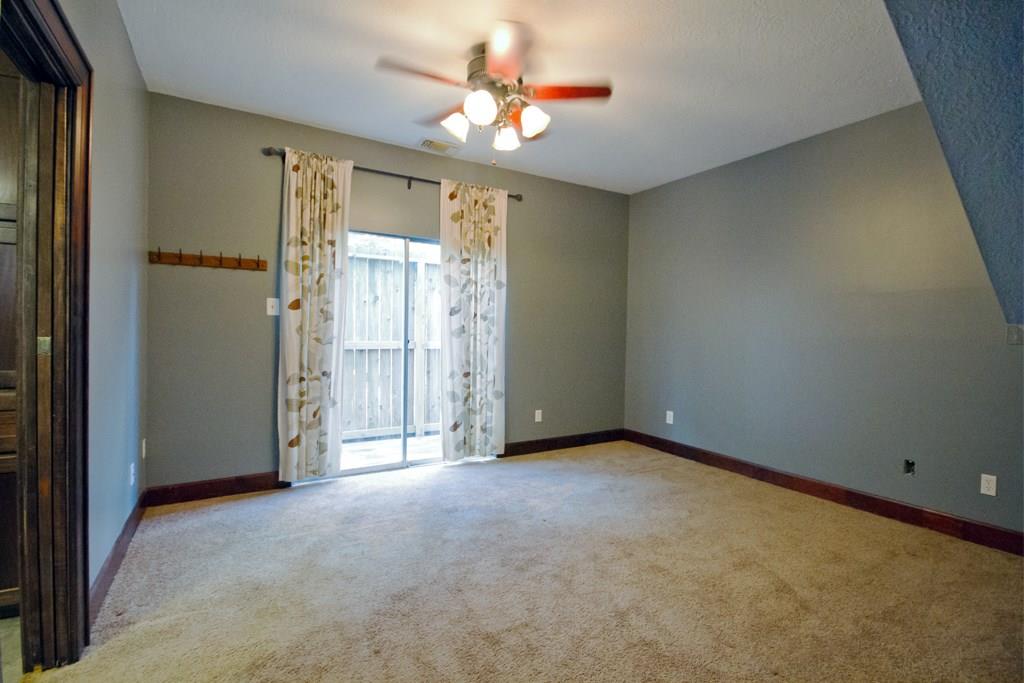 Master bedroom with access to backyard patio