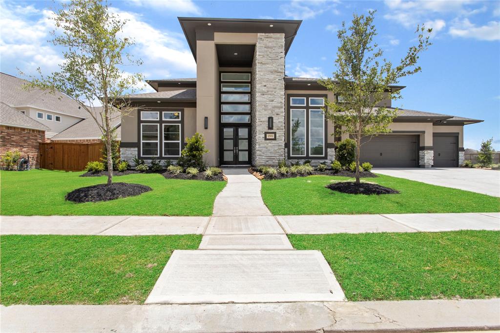 17951 Bandera Ridge Lane Cypress, Texas This Newmark Homes VERSAILLES is luxury living at its finest! The contemporary exterior of the home is the first clue that you're about to see something truly special. Inside you'll find a grand entry that is filled with light from the courtyard windows, 2 staircases and an open floor plan that has fantastic flow. There are details galore in this home! Always wanted a pot-filler? It's got it! Need a custom closet in the master? It's got it! Want backpack storage for the kids? It's got it! There are too many details to mention, from the porcelain floors through out, to the luxury features in the master bath, you'll need to come and see for yourself! Move-in ready!