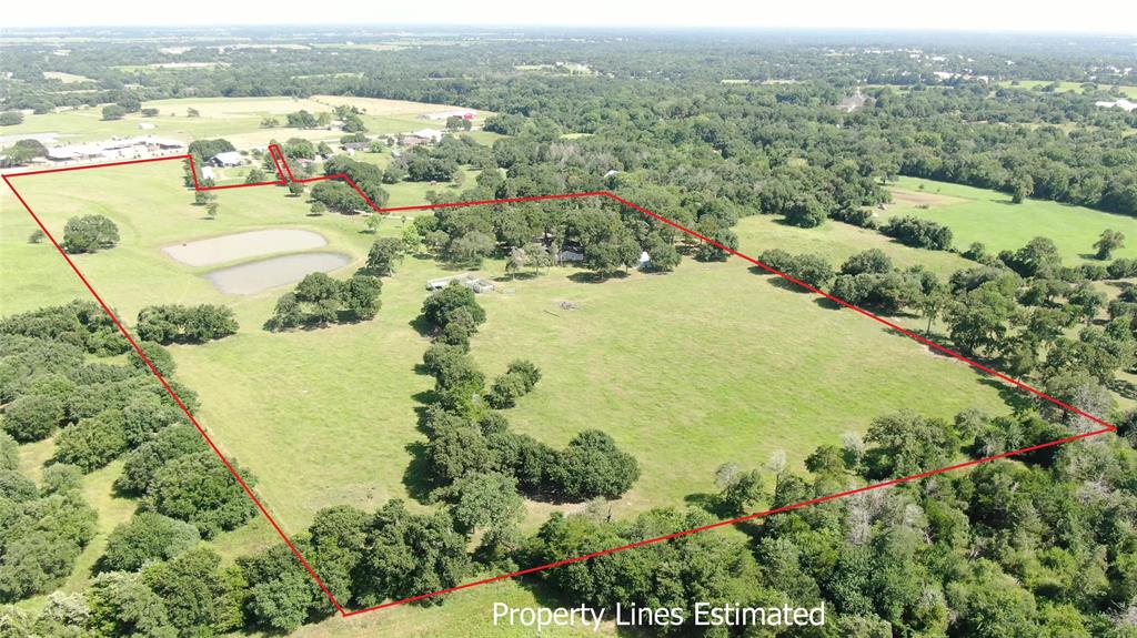 1440 St Highway 237 Round Top, Texas Unique opportunity in Round Top! 21+ Acres with substantial road frontage on the Higher-End of HWY 237/Antique Corridor, with hot-spot venues surrounding. There are also 2 homes on the property, nestled in the live oaks and overlooking the ponds. Main house is 2700+ sq ft with 4 bedrooms/3 ½ baths, large kitchen and is great for entertaining. Guest House has 2 bedrooms/2 baths. Pretty views and open spaces lends this property to lodging in the back and a great venue in the front.
So much potential in this location!