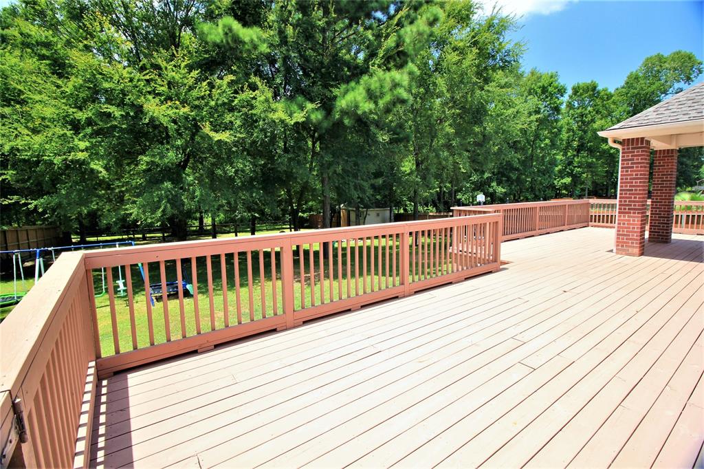10693 Sunflower Drive Conroe, Texas Located less than a mile from I-45 in Forest Creek! Many upgrades throughout this home including water softener, security system, nest thermostat, Vuebell doorbell and more. This 4 bedroom home sits on a .78 acre lot and has a huge deck overlooking the peaceful fully fenced backyard. The open floor plan does wonders for this home! The kitchen features granite counter, corner pantry, gas oven, stainless steel appliances and a breakfast bar. Master suite with en suite master bath featuring a huge walk-in closet with extra storage space. Private office space with French doors! All secondary bedrooms are of great size and have walk-in closets! Game room on secondary floor! This home is a must see!