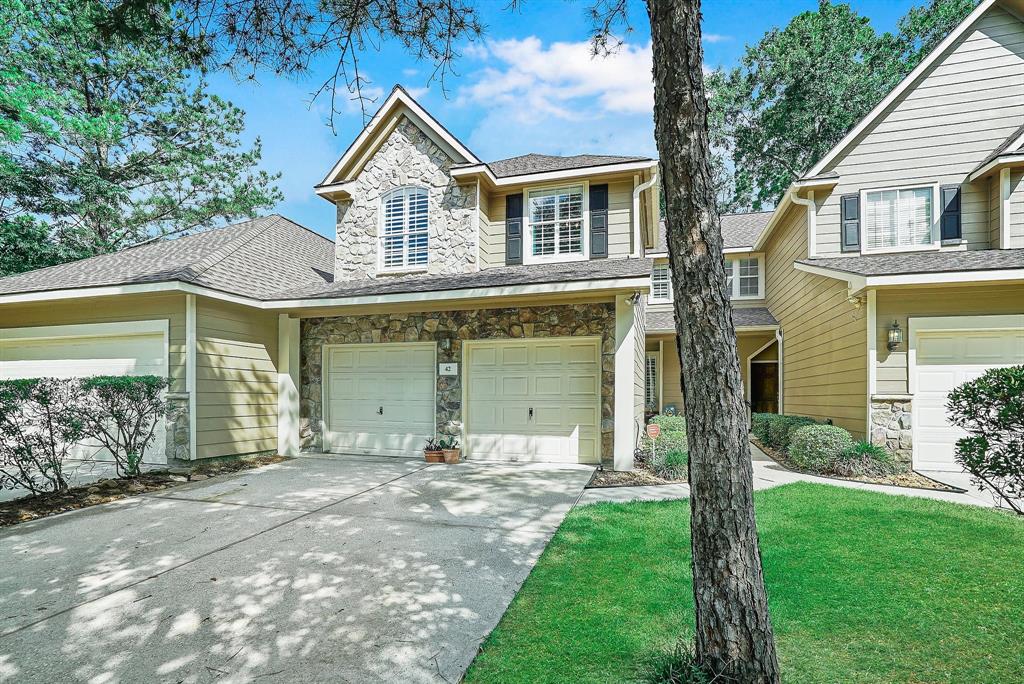 42 Scotch Pine Court The Woodlands, Texas Gorgeous 2 Story Townhome that has been renovated from top to bottom. Custom made Plantation Shutters, wood flooring and tile downstairs. Beautiful kitchen with granite and stainless steel appliances. Carpeting upstairs, custom paint and professional landscaped backyard.