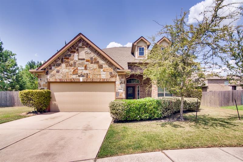 6018 Lofty Lane Spring, Texas Former model home with tons of upgrades! Brick and stone front sets this home apart! Large front porch! Inviting two story foyer! Large Formal Dining Room! Neutral colors throughout! Kitchen boast granite counters and pendant lights! Open concept Family Room with corner fireplace! Upstairs Game Room offers generous space! Home is conveniently located!