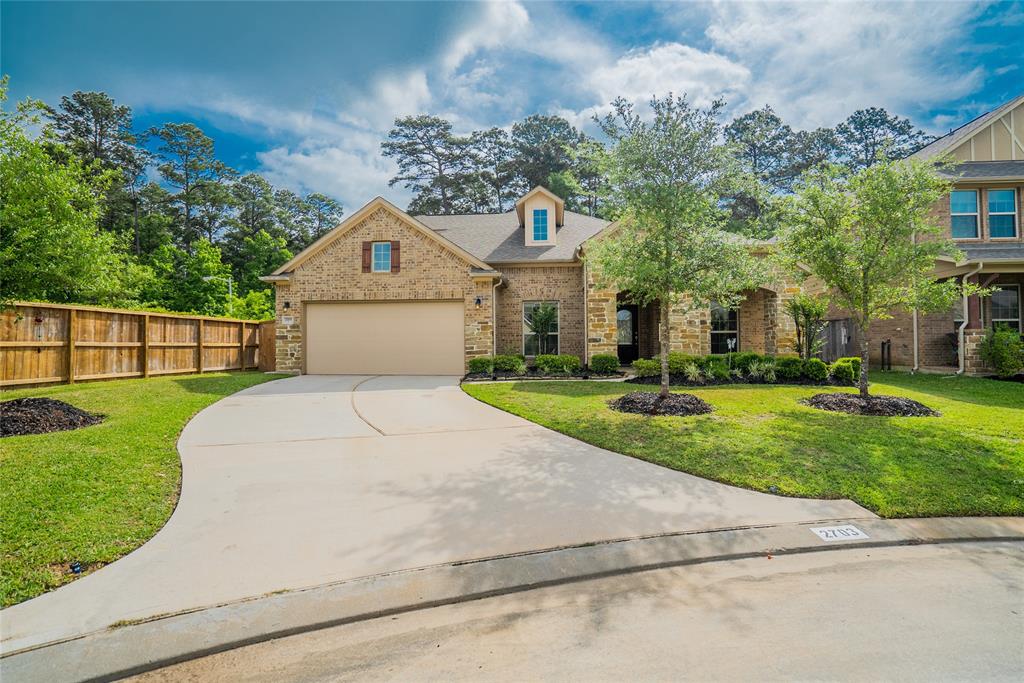 2703 Bay Laurel Lane Conroe, Texas Available Sept 1st for move in. High and Dry from Harvey! Sophisticated and luxurious home now available in the highly acclaimed Graystone Hills community. This beautiful custom home is nestled on an amazing corner lot at the end of a cul-de-sac. No rear neighbors! Every detail for this dream home was carefully selected and quality crafted. Custom touches include top-of-the-line chef's kitchen with 42' cabinets with premium finishes, fixtures and stainless steel appliances, stunning wood floors in the study and dining rooms, upgraded carpet and tile floors, designer light fixtures, huge master suite with spa inspired bath, all bedrooms downstairs, full sprinkler system, pre-wired for surround sound both in the living room and upstairs game room, Tankless water heater, 15 SEER HVAC system, Energy Star 3.0 rated and so much more! Call to schedule your appointment today.