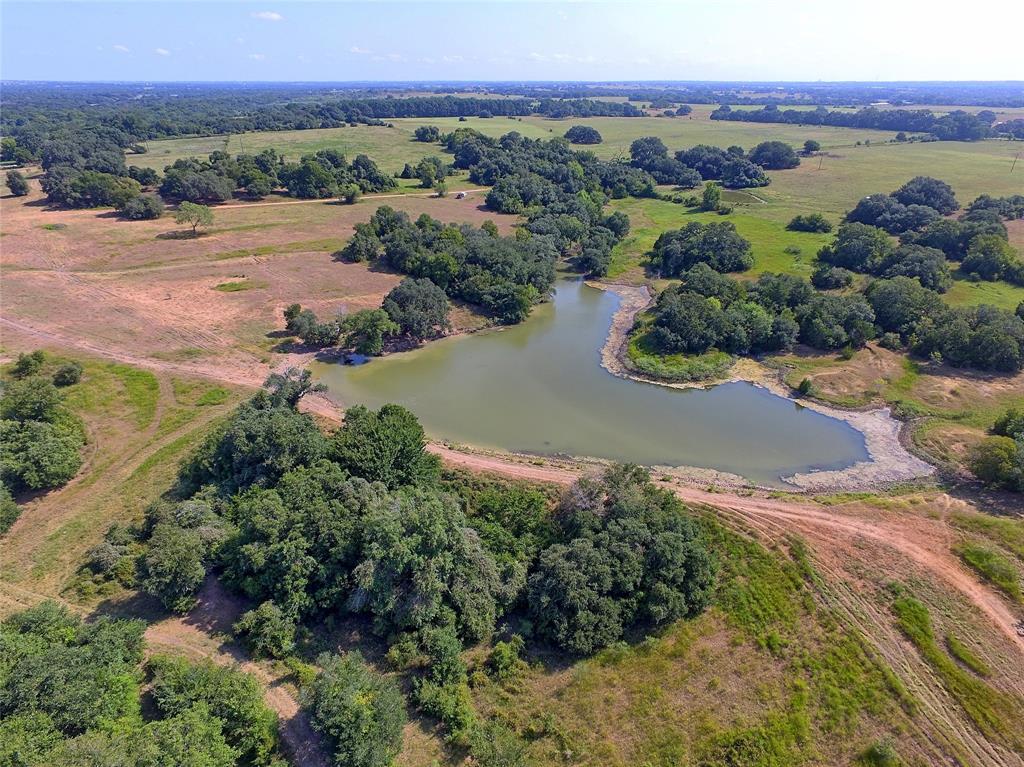 2424 County Road 250 Weimar, Texas Located in Colorado & Fayette Counties just 10min south of Weimar I-10 Exit 682 off CR 250, this 381.734 acre recreational tract has an ideal home site with HILL-TOP view of the rolling countryside, pastureland for livestock grazing & wooded areas providing ideal wildlife habitat. The property features unmatched diversity highlighted by live East Navidad River establishing the west boundary, two ponds, 110' of elevation change, mature LIVE OAKS, cross-fencing, electricity & water well. A rustic barn could be restored or utilized for highly sought-after material for furniture projects. The property consists of mostly clay soils, is located within the Gulf Coast Aquifer, ag-exempt & situated within 1hr of BUC-EE'S in Katy or Bastrop. The property is accessed off paved CR 250 by a fee simple lane being approx. 35' wide x 1,500' long. No pipeline or oil/gas production affecting property. Survey available. This is a unique property where there’s something for everyone to appreciate.