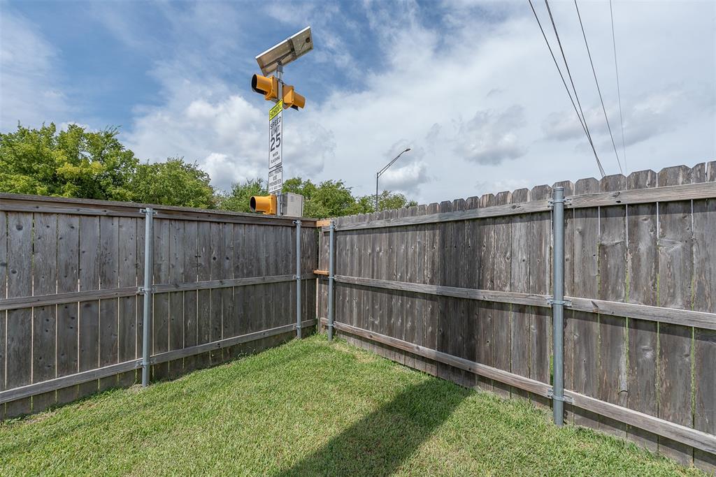 From corner to corner, this backyard is a BIG bonus. The "school zone" flashing sign signals that schools are close by.