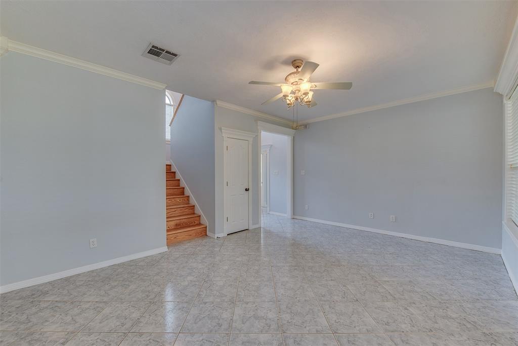 Just off the breakfast area is a family room that leads to the main entrance, a full bath, and the master bedroom with ensuite.