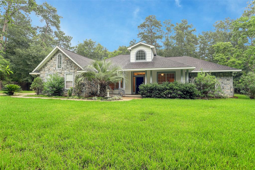 322 Skylark Street Magnolia, Texas PRICED TO MOVE FAST!!! MOTIVATED SELLER!!! BRING ALL OFFERS! MUST SEE TO APPRECIATE!!!! BEFORE YOU MISS THIS OPPORTUNITY!! GATED PROPERTY!! 3 BR / 2 Bath on nearly 1 acre lot with no back neighbors and the lot is surrounded by trees for maximum privacy!! Your new home is located in one of Magnolia's most highly sought after subdivisions and the acclaimed Magnolia ISD! New wood-look ceramic tile floors, 10' ceilings, split floor plan, and huge upstairs bonus room that could be an office, playroom, or man cave!! Huge updated kitchen with granite counter tops! Huge master bedroom with sitting area is complimented by an exquisite Master bath with electric fireplace above the whirlpool tub, accompanied by a huge walk-in shower and fabulous vanity!!