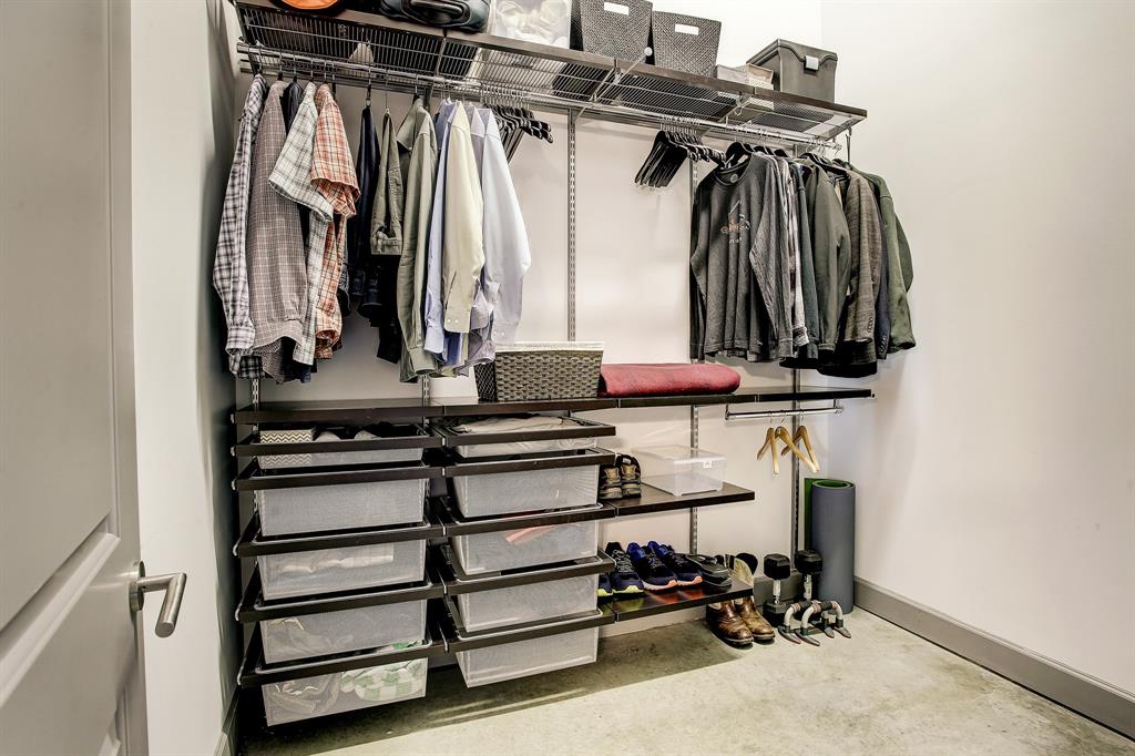 The master closet is outfitted with flexible Elfa components...