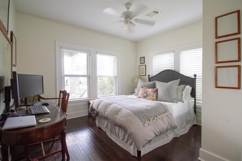 Second bedroom with 2 closets and same beautiful wood floors found throughout the home
