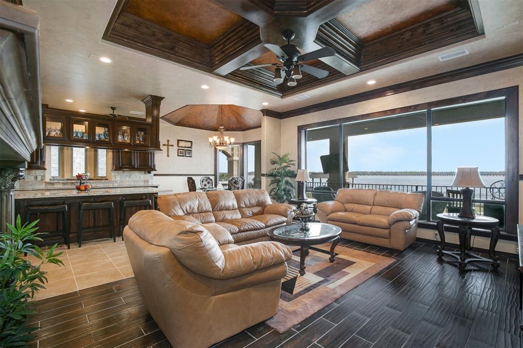 8830 Cross Country Drive Houston, Texas Welcome home to this stunning custom built Spanish style 2 bedroom, 2 bath home nestled on a beautiful Lake Houston lot! It features decorative lighting, crown molding, soaring coffered ceilings, & tile flooring in main living area & kitchen. Massive private master suite with water views includes frameless shower, double sinks, granite counters, separate vanity & large tub. Eat-in kitchen is well equipped with beautiful granite counters, SS appliances, extra storage space & island. One secondary bedroom, spacious w/ high ceilings, full bath, & spacious living, dining & office space complete this home! Enjoy the oversized water view backyard with covered patio & plenty of space to for outdoor activities & entertaining!
Did NOT flood in Imelda.