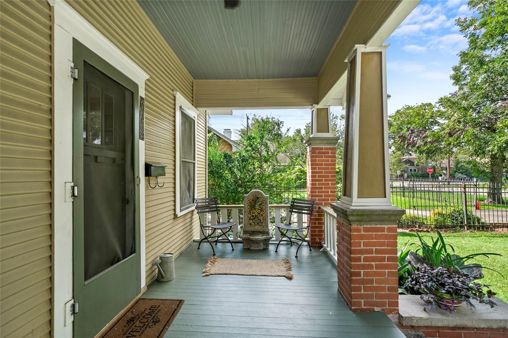 Enjoy your morning coffee on the classic Heights front porch.