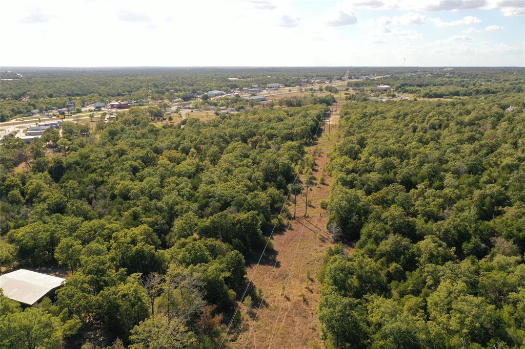 TBD Lumberjack Court Bastrop, Texas 25 acres of property in close proximity to TX 71. Only 5 acres of this land is restricted and the remaining is unrestricted. Property backs to Bastrop's prestigious neighborhood The Colony and also borders The Woodlands. Come build your dream home and have plenty of land to play on all while being close to Bastrop and Austin.