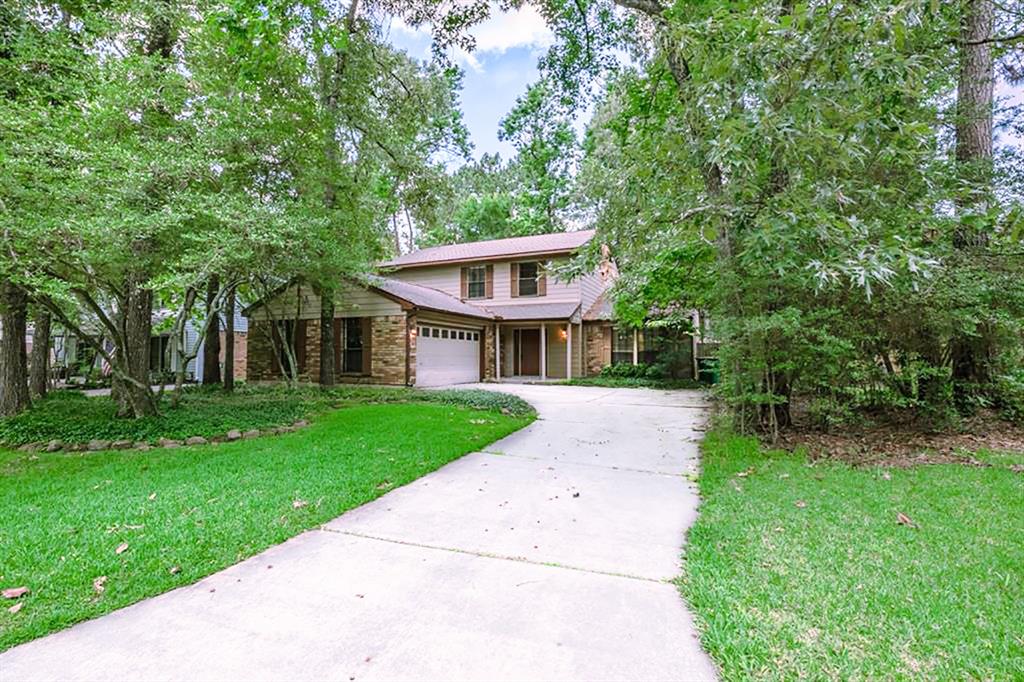 23 Windfellow Place The Woodlands, Texas This home boasts fairly recent upgrades such as granite countertops and vanities, new light fixtures, all rooms painted. Big den with slate floors, cozy fireplace, and built-in bookcases with storage. This is a great home...HURRY IN TO SEE!