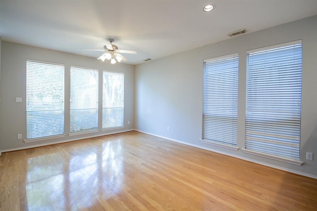 Tons of natural light floods the living space. Two-inch blinds are also found throughout.