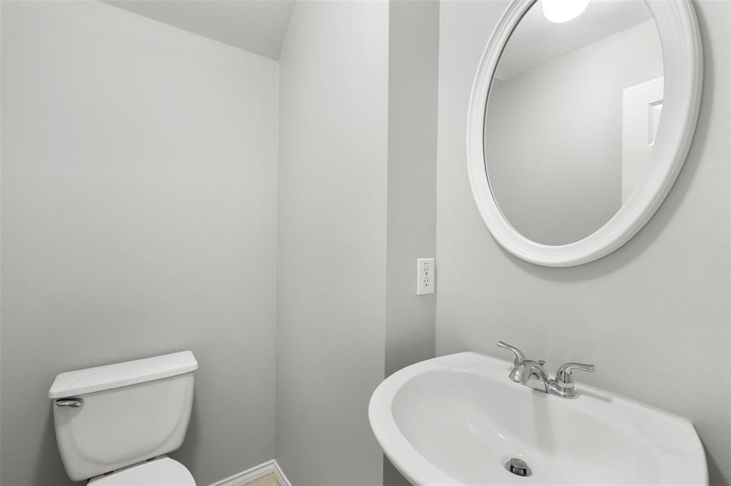 This half bath is located on the 1st floor.