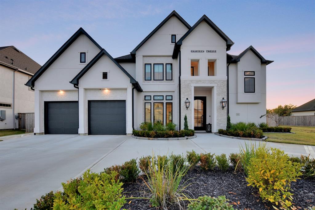 1812 Grace Crossing Friendswood, Texas Absolutely Gorgeous Custom Home w/Modern European Elegance. Open light filled interior nearly new 4 BR home w/remarkable open floorpan & exceptionally high end features w/an emphasis on interior design, Include Carrara Marble and White French Oak Floors throughout the Opulent Dining Room & Spacious Family room w/Cast Stone Fireplace & the Beautiful Gourmet Island Kitchen with Porcelain & Leathered Granite Countertops, 6 burner gas Thermador cooktop, double ovens, built in wine fridge, butler's pantry and sunlit breakfast room.Entertain on a Grand Scale w/ease in these large open rooms.Secluded Master suite w/spa glamorous bath, double shower & oversized soaker tub.The upstairs boast 3 additional BR's & 2 full baths, Game Room w/media room, & the study. Outdoors, Relax in your resort style backyard with sparkling pool & hot tub, fireplace and complete outdoor kitchen. Circular driveway, Gated neighborhood. Friendswood ISD schools. NEVER FLOODED!