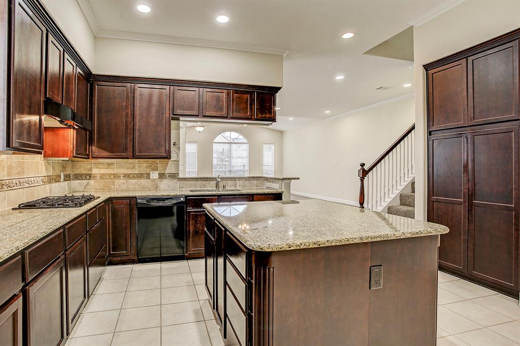 This kitchen has so much counter and cabinet space.  To the right outside the photo is the utility closet with washer and dryer, a half bath and fabulous under stair storage space.
