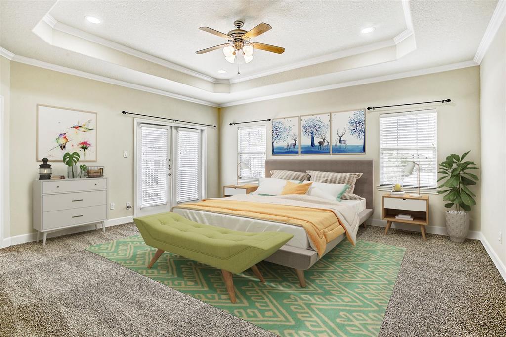 All bedrooms are upstairs in this home, and this is the very spacious master.  The double doors lead to a private deck.  This room has been virtually staged.