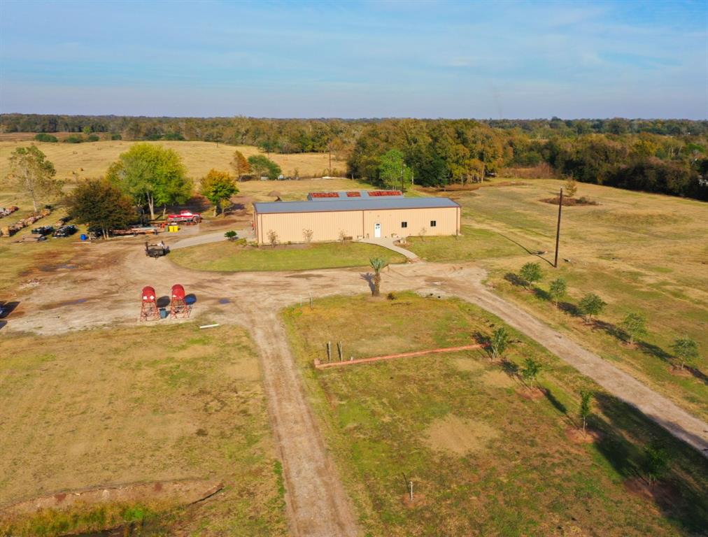 3246 Meyer Road Sealy, Texas 10 Acre property located between Katy and Sealy just 1/2 mile off of I-10! 100'x 40' building built in 2016 sits high and dry on the property! **AC and Heated ** Office space, Restrooms, break room, and foyer, areas approx 2000 sq feet. The other half is a warehouse with it's own half bath. 2nd building is 40' X 25' approx. currently used for welding shop. Warehouses ready up for a small business owner/distributor.
Or, convert the space to a Barndominium! The surrounding area has other single family homes, ranches, and equine facilities. Ideal size for the project minded DIY buyer looking for the right location! Extra parking, 2 wells and aerobic septic system have been well maintained. Owner, as a golf enthusiast & built 5 tee boxes for driving and chipping practice.
All showings must be accompanied. Property is currently used for a commercial landscape company. Make sure to click the links for drone video tours and other information about this unique property!