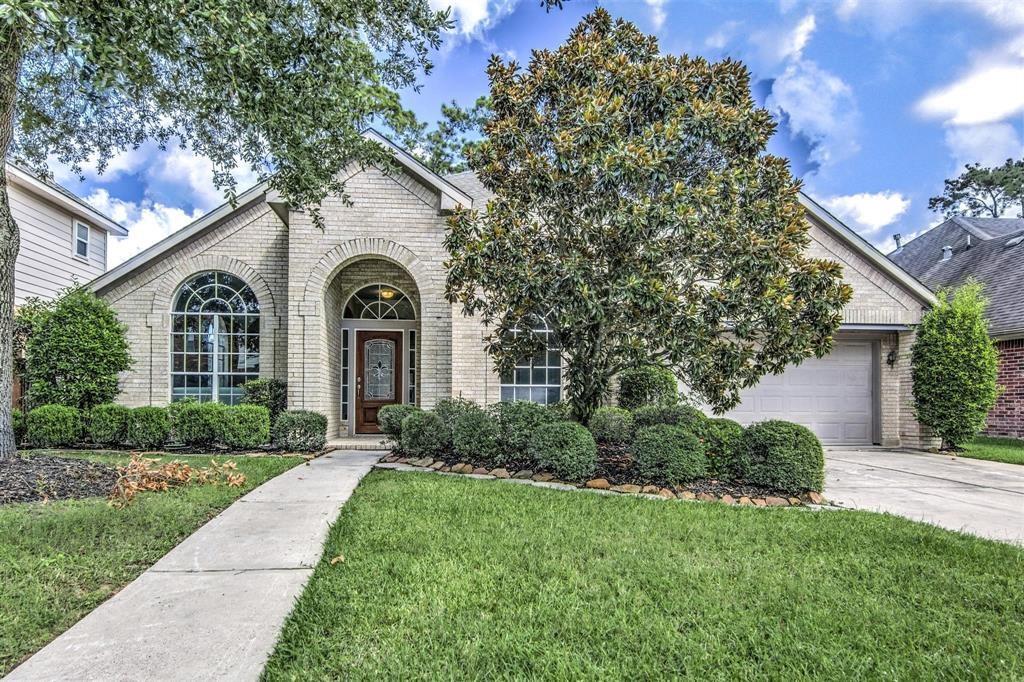 6326 Sampras Ace Court Spring, Texas This light and bright home in GATED COMMUNITY is a must see! It offers a lot of natural lighting, including a skylight in the kitchen. The kitchen also has stainless appliances, farmhouse kitchen sink and lovely granite countertops. Gorgeous wood flooring in hallways and main living areas; title in wet areas; carpet in bedrooms. The 4th bedroom can be used as a private study or bedroom (it DOES have closet inside the room.) Large walk-in closets, including His and Her closets for master. 2" blinds on windows. Home sits on a large lot on Cul-De-Sac. Yard is fully fenced.