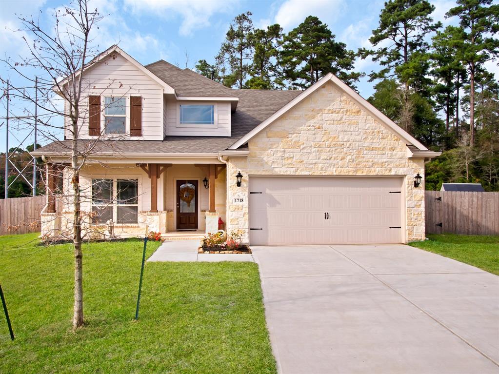 1718 Wandering Hills Road Conroe, Texas High and Dry from Harvey! Gorgeous home now available in the highly acclaimed Canyon Creek Subdivision. Every detail for this home was carefully selected and quality crafted. This meticulously kept home shows like a model! Custom Features include a gourmet kitchen with stainless steel appliances, gorgeous cabinets, designer backsplash, custom barn doors, wrought iron balusters, bathroom granite vanities, spacious family room, fantastic master suite, spa inspired master bath with dual vanities, garden tub and separate shower, ample size secondary bedrooms, perfect size game room, home office/ formal dining, HUGE lot with no rear neighbors and so much more!! Do not miss your chance at this one. Call to schedule your appointment today!!