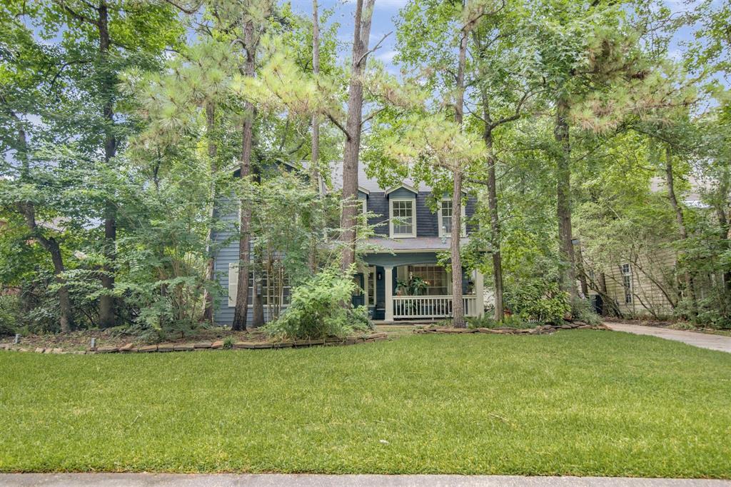 143 N Mill Trace Drive The Woodlands, Texas Honey stop the car! With a beautiful front porch and private backyard, formal dining, formal living, study/office, a den that is open to your kitchen and breakfast area, and all 4 bedrooms upstairs. Hardwood floors, crown moulding, double sinks in both master and 2nd bath, large kitchen & utility room, great landscaping, detached 2.5 garage with shelving,right in the middle of The Woodlands! Come and see to appreciate it.