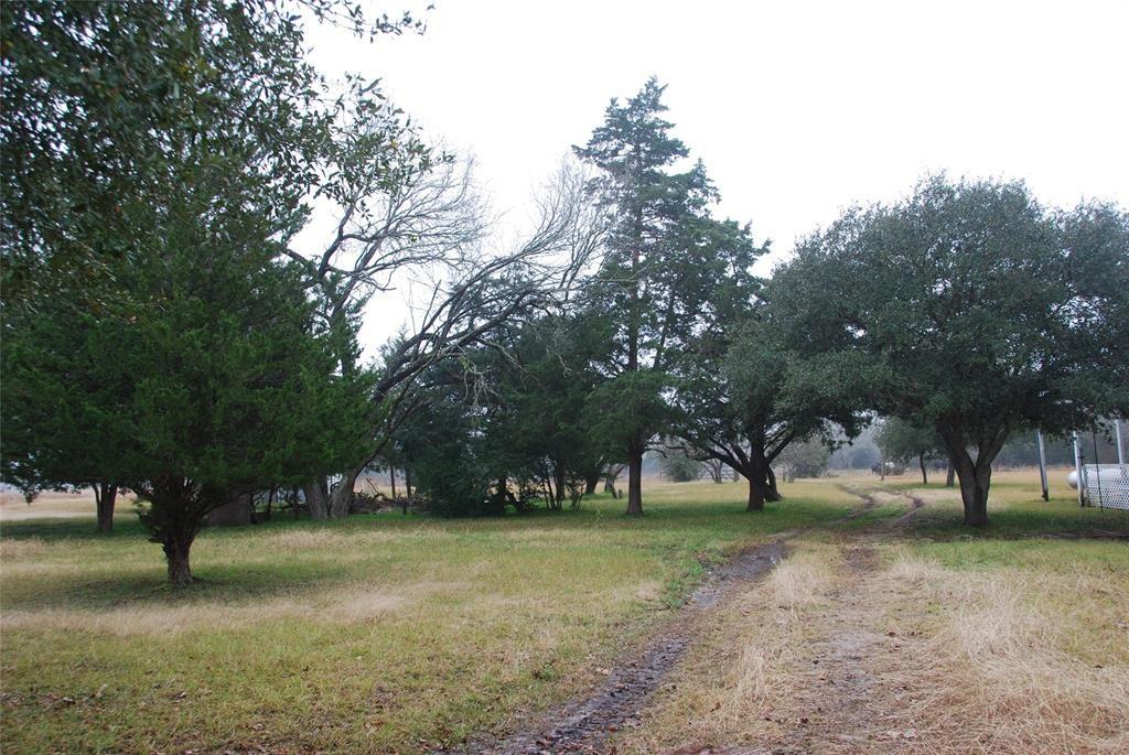 7791 Fm 1372 Road North Zulch, Texas Beautiful, Unrestricted 53+ Acres off paved FM 1372 in North Zulch, Texas. 3/2 Manufactured Home is set up with Utilities and Situated in a Park Like Setting Surrounded by Oaks and Cedars. This Fenced Property Offers a Wide Variety of Uses with it's two Large Stocked Ponds, Barns and Open Pastures. This Beautiful Property Offers a Great Opportunity for your Dream Home, Livestock, Hunting and Fishing! Just a Short Drive to Bryan/College Station. Bring the Family and Let the Memories Begin!